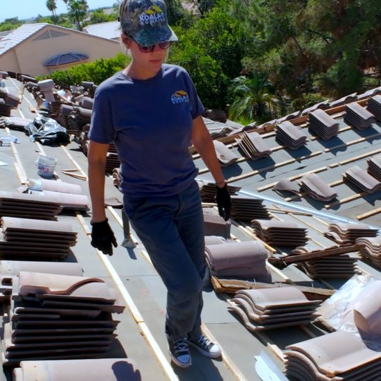 Roofing Contractor Standing on Roof
